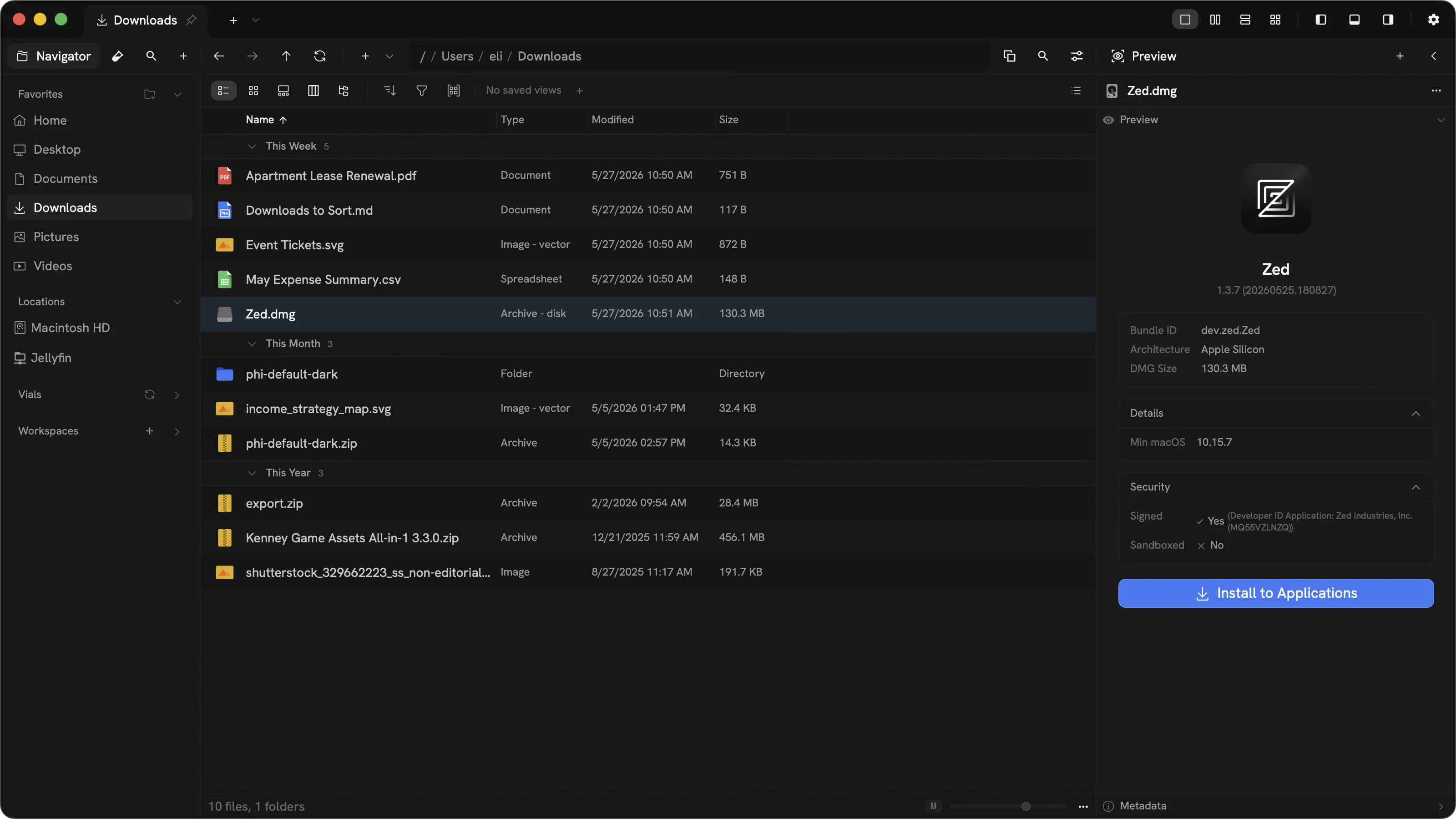 Phials browsing the Downloads folder with date-grouped files and a macOS app installer preview